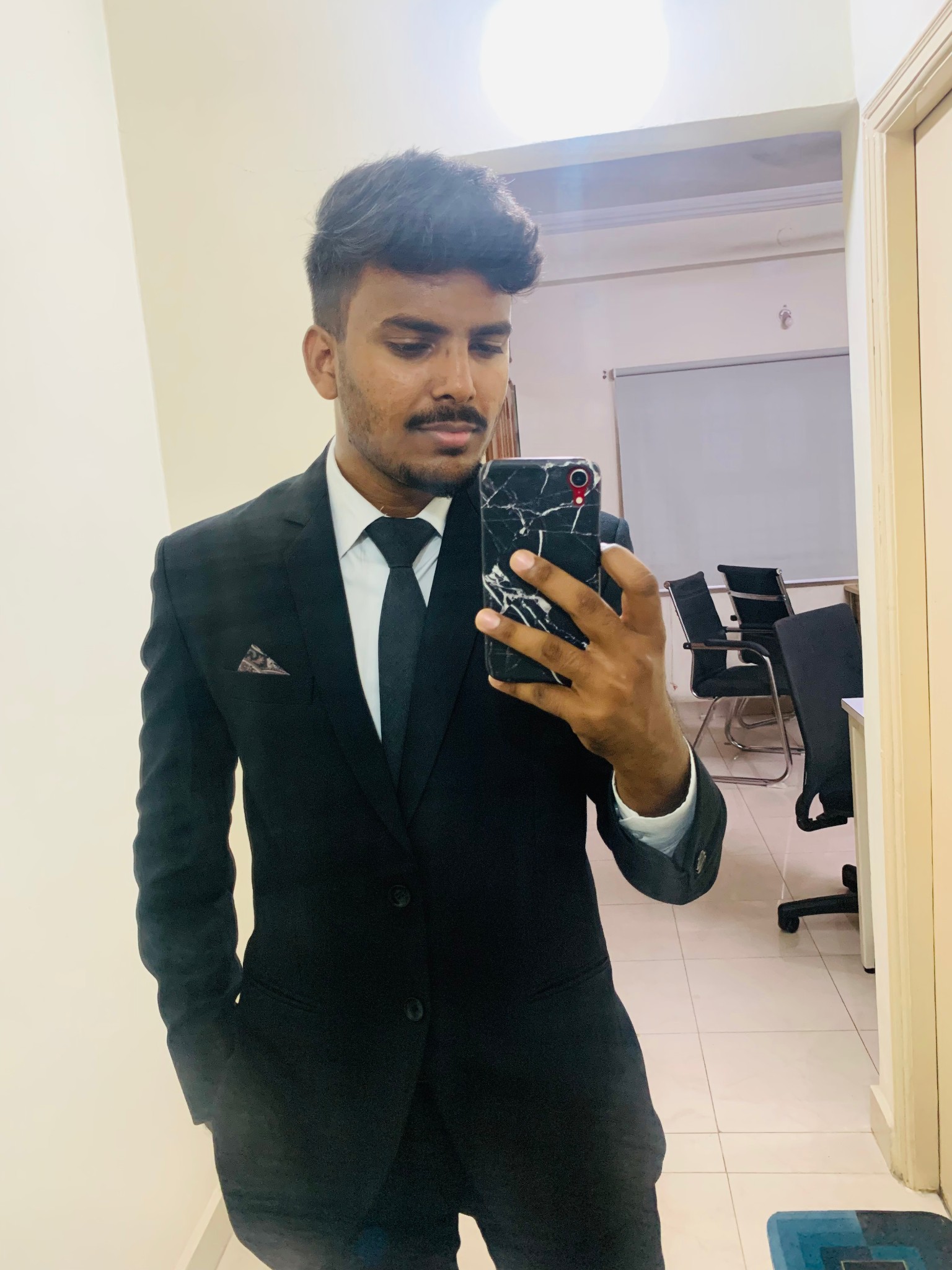 Naveen K